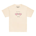 Beige t-shirt with a heart sunglasses graphic and text on a white background